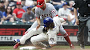 Angels third baseman Zack Cozart (7) tags out Seattle Mariners left fielder Ben Gamel (16) to end the fifth inning at Safeco Field on May 6, 2018.