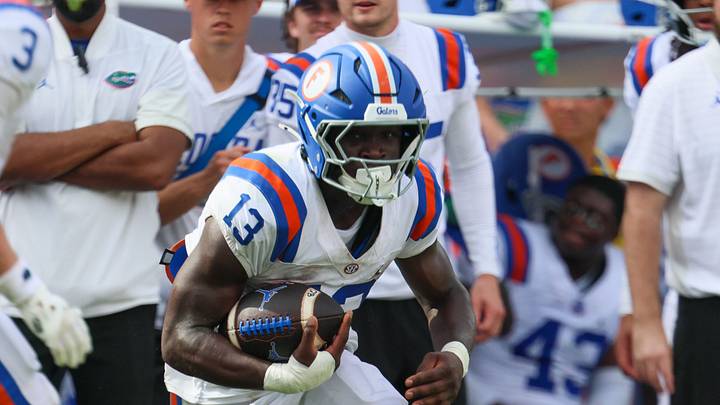 Florida running back Jadan Baugh (13) runs during the second half of an NCAA football at Steve Spurrier Field at Ben Hill Griffin Stadium in Gainesville, FL on Saturday, October 10, 2026. [Alan Youngblood/Gainesville Sun]