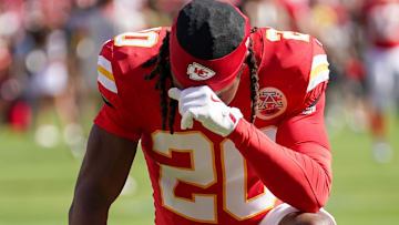 Sep 28, 2025; Kansas City, Missouri, USA; Kansas City Chiefs cornerback Nohl Williams (20) kneels in the end zone against the Baltimore Ravens prior to a game at GEHA Field at Arrowhead Stadium.