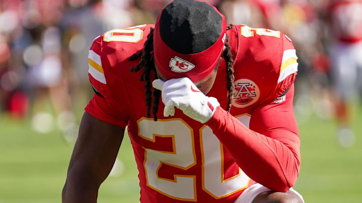 Sep 28, 2025; Kansas City, Missouri, USA; Kansas City Chiefs cornerback Nohl Williams (20) kneels in the end zone against the Baltimore Ravens prior to a game at GEHA Field at Arrowhead Stadium.