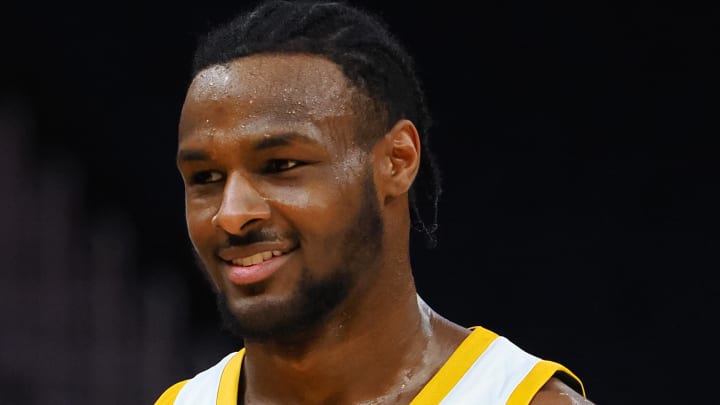 Jul 10, 2024: Los Angeles Lakers guard Bronny James Jr. smiles between plays against the Miami Heat during the fourth quarter at Chase Center.