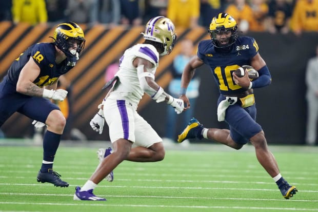 Michigan Wolverines football quarterback Alex Orji