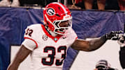 Georgia Bulldogs running back Chauncey Bowens (33) celebrates his touchdown in the second half in an NCAA football game, Saturday, Nov. 1, 2025, at EverBank Stadium in Jacksonville, Fla. Georgia defeated Florida 24-20. [Doug Engle/Florida Times-Union]