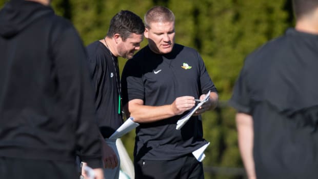 Oregon Coach Dan Lanning & Coach Tosh Lupoi