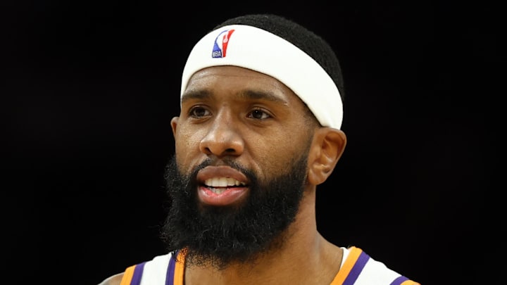 Feb 5, 2026; Phoenix, Arizona, USA; Phoenix Suns forward Royce O'Neale (00) against the Golden State Warriors at Mortgage Matchup Center. Mandatory Credit: Mark J. Rebilas-Imagn Images