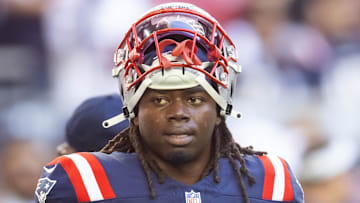 Dec 15, 2024; Glendale, Arizona, USA; New England Patriots running back Rhamondre Stevenson (38) against the Arizona Cardinals at State Farm Stadium. Mandatory Credit: Mark J. Rebilas-Imagn Images