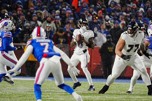 Buffalo Bills cornerback Taron Johnson in coverage against quarterback Lamar Jackson and the Baltimore Ravens.