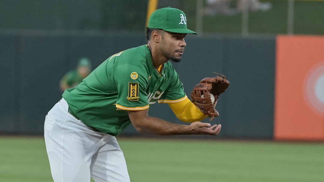 Aug 25, 2025; West Sacramento, California, USA; Athletics third baseman Darell Hernaiz (2) makes a play against the Detroit Tigers during the third inning at Sutter Health Park. Mandatory Credit: Ed Szczepanski-Imagn Images