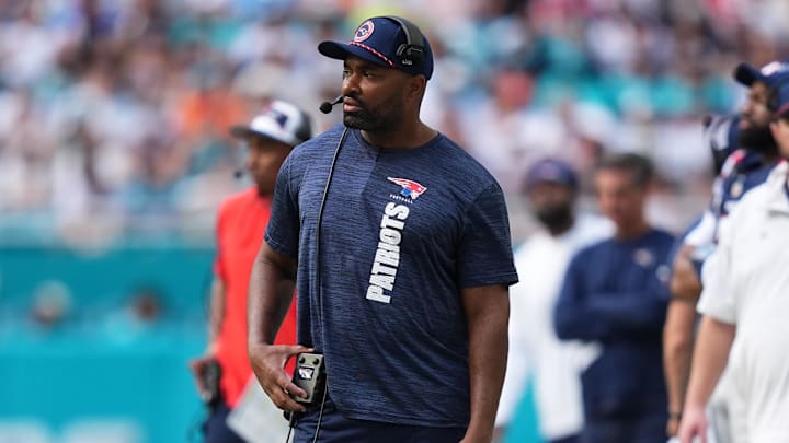 Nov 24, 2024; Miami Gardens, Florida, USA; New England Patriots head coach Jerod Mayo walks down the sideline during the first half against the Miami Dolphins at Hard Rock Stadium. Mandatory Credit: Jasen Vinlove-Imagn Images