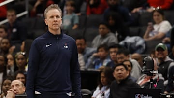 Apr 9, 2025; Washington, District of Columbia, USA; Washington Wizards head coach Brian Keefe looks on from the bench against the Philadelphia 76ers in the second half at Capital One Arena. Mandatory Credit: Geoff Burke-Imagn Images