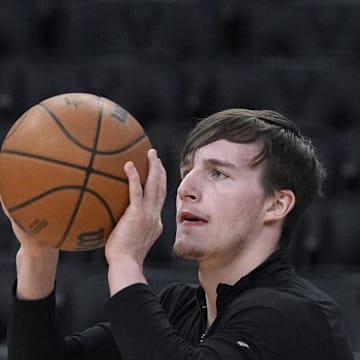 New York Knicks guard Tyler Kolek puts up a shot during pregame warmups before a game against the Milwaukee Bucks. Mandatory Credit: Michael McLoone-Imagn Images