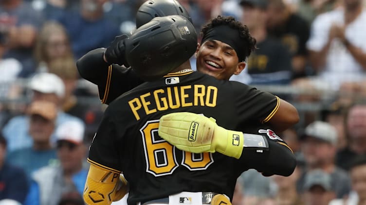 Aug 1, 2023; Pittsburgh, Pennsylvania, USA;  Pittsburgh Pirates catcher Endy Rodriguez (rear)