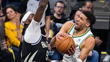 Apr 22, 2025; Indianapolis, Indiana, USA; Indiana Pacers guard Tyrese Haliburton (0) shoots the ball while  Milwaukee Bucks forward Bobby Portis (9) defends during game two of first round for the 2024 NBA Playoffs at Gainbridge Fieldhouse. Mandatory Credit: Trevor Ruszkowski-Imagn Images