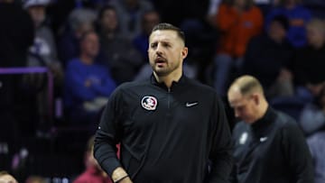 Nov 11, 2025; Gainesville, Florida, USA; Florida State Seminoles head coach Luke Loucks looks on against the Florida Gators at Exactech Arena at the Stephen C. O'Connell Center. Mandatory Credit: Morgan Tencza-Imagn Images