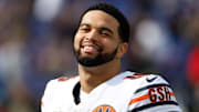 Oct 26, 2025; Baltimore, Maryland, USA; Chicago Bears quarterback Caleb Williams (18) looks on before the game against the Baltimore Ravens at M&T Bank Stadium. Mandatory Credit: Geoff Burke-Imagn Images
