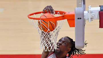 The University of Alabama men’s basketball teams works out in practice Thursday, Sept. 26, 2024. Alabama center Clifford Omoruyi (11) dunks the ball over Alabama forward Aiden Sherrell (22).
