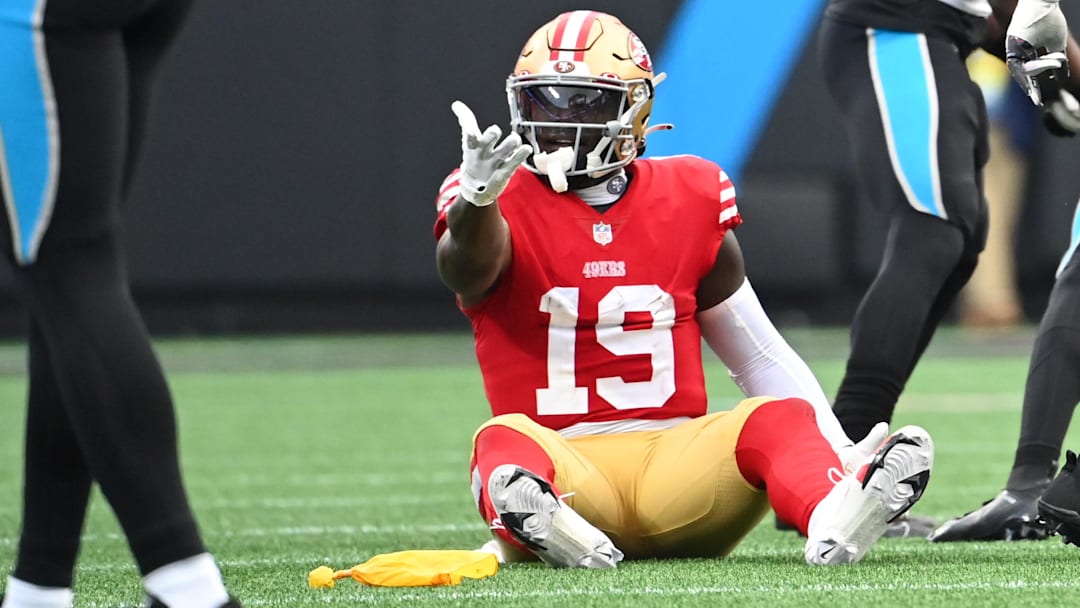 Oct 9, 2022; Charlotte, North Carolina, USA; San Francisco 49ers wide receiver Deebo Samuel (19) reacts after being fouled in the third quarter at Bank of America Stadium. Mandatory Credit: Bob Donnan-Imagn Images