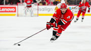 Nov 7, 2024; Raleigh, North Carolina, USA;  Carolina Hurricanes center Seth Jarvis (24) skates with the puck against the Pittsburgh Penguins during the first period at Lenovo Center. Mandatory Credit: James Guillory-Imagn Images