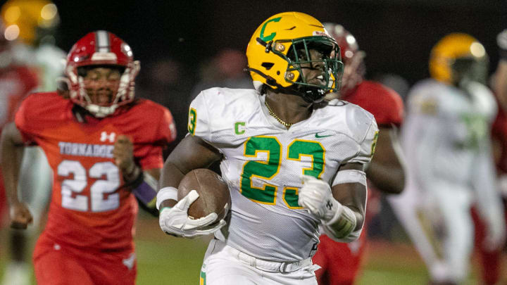 Pensacola Catholic middle linebacker Nigel Nelson (23) funs the ball during first half action as Bradford takes on Pensacola Catholic during a play off game in the 2023 FHSAA Football State Championship at Bradford High School in Starke, FL on Friday, December 1, 2023. [Alan Youngblood/Gainesville Sun]