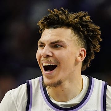 Dec 17, 2024; Kansas City, Missouri, USA; Kansas State Wildcats guard Coleman Hawkins (33) reacts after scoring during the second half against the Drake Bulldogs at T-Mobile Center. Mandatory Credit: Jay Biggerstaff-Imagn Images