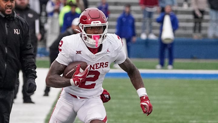 Oct 28, 2023; Lawrence, Kansas, USA; Oklahoma Sooners running back Jovantae Barnes (2) runs the ball