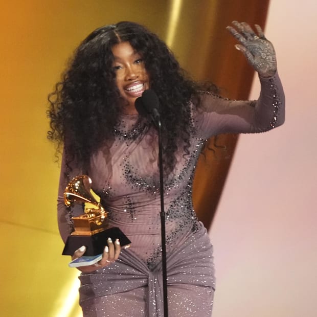 SZA accepts the award for best R&B Song during the 66th Annual Grammy Awards.