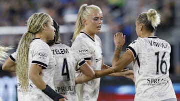 May 2, 2025; Washington, District of Columbia, USA; Angel City FC forward Riley Tiernan (33) celebrates with teammates after scoring a goal against the Washington Spirit during the first half at Audi Field. Mandatory Credit: Geoff Burke-Imagn Images