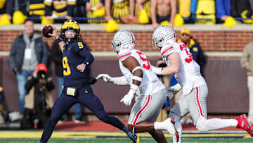 Michigan quarterback J.J. McCarthy looks to pass against Ohio State 