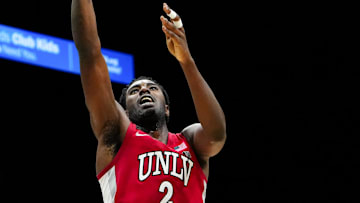 Nov 25, 2025; Las Vegas, Nevada, USA; UNLV Rebels forward Kimani Hamilton (2) shoots the ball in the second half against Alabama Crimson Tide in a 2025 Players Era Festival group play game at MGM Grand Garden Arena. Mandatory Credit: Stephen R. Sylvanie-Imagn Images