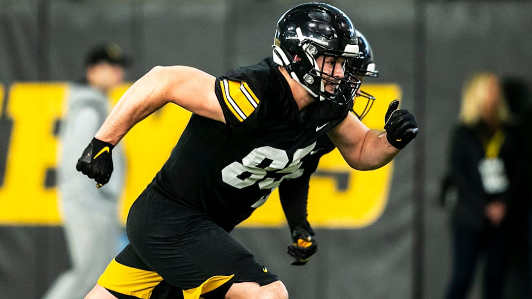 Iowa tight end Luke Lachey (85) runs a route during a spring NCAA football practice, Thursday, March 30, 2023, at the University of Iowa Indoor Practice Facility in Iowa City, Iowa