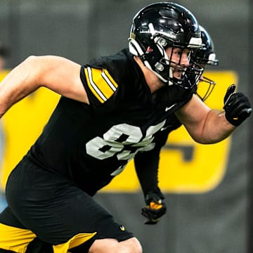 Iowa tight end Luke Lachey (85) runs a route during a spring NCAA football practice, Thursday, March 30, 2023, at the University of Iowa Indoor Practice Facility in Iowa City, Iowa