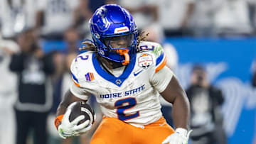 Dec 31, 2024; Glendale, AZ, USA; Boise State Broncos running back Ashton Jeanty (2) against the Penn State Nittany Lions during the Fiesta Bowl at State Farm Stadium. Mandatory Credit: Mark J. Rebilas-Imagn Images