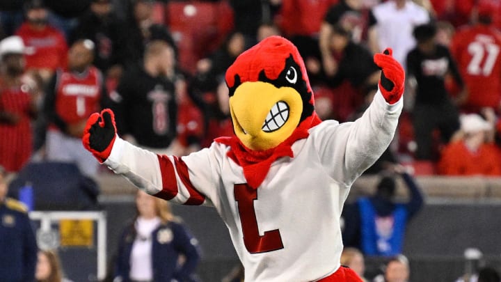 Oct 7, 2023; Louisville, Kentucky, USA; The Louisville Cardinals mascot performs before the team faces off against the Notre Dame Fighting Irish at L&N Federal Credit Union Stadium. Louisville defeated Notre Dame 33-20. Mandatory Credit: Jamie Rhodes-USA TODAY Sports