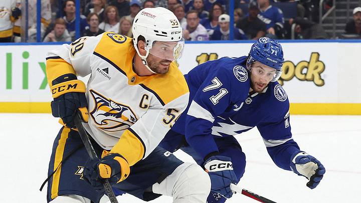 Oct 28, 2024; Tampa, Florida, USA; Nashville Predators defenseman Roman Josi (59) skates with the puck as Tampa Bay Lightning center Anthony Cirelli (71) defends during overtime at Amalie Arena. Mandatory Credit: Kim Klement Neitzel-Imagn Images Oct 28, 2024; Tampa, Florida, USA; Nashville Predators defenseman Roman Josi (59) skates with the puck as Tampa Bay Lightning center Anthony Cirelli (71) defends during overtime at Amalie Arena. Mandatory Credit: Kim Klement Neitzel-Imagn Images