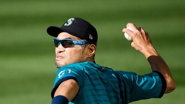 Seattle Mariners former outfielder Ichiro Suzuki plays catch during batting practice against the Oakland Athletics at T-Mobile Park in 2021. 