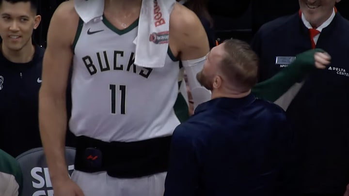 Brook Lopez’s torso and Conor McGregor could not fit in the same frame together without zooming out. Brook Lopez’s torso and Conor McGregor could not fit in the same frame together without zooming out.