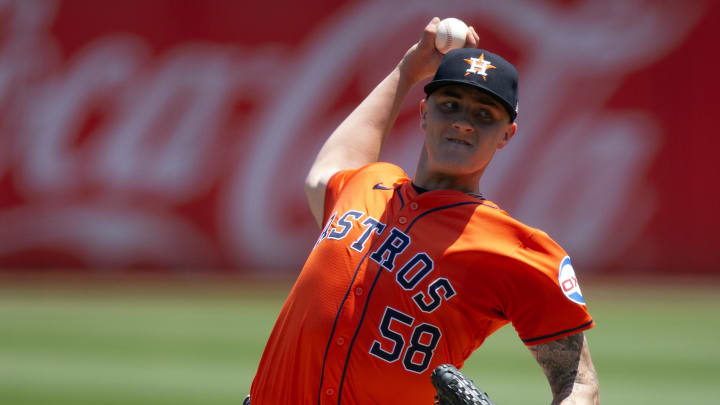 Jul 24, 2024; Oakland, California, USA; Houston Astros starting pitcher Hunter Brown (58) delivers against the Oakland Athletics during the first inning at Oakland-Alameda County Coliseum. Mandatory Credit: D. Ross Cameron-USA TODAY Sports