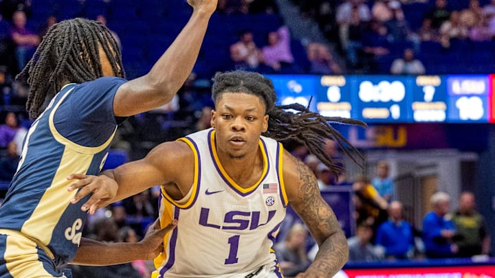 Nov 19, 2024; Baton Rouge, Louisiana, USA;  LSU Tigers guard Jordan Sears (1) dribbles against the Charleston Southern Buccaneers during the first half at Pete Maravich Assembly Center. Mandatory Credit: Stephen Lew-Imagn Images