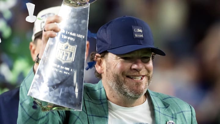Seattle Seahawks general manager John Schneider celebrates with the Vince Lombardi trophy