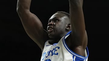 Apr 5, 2025; San Antonio, TX, USA; Duke Blue Devils center Khaman Maluach (9) dunks against the Houston Cougars during the second half in the semifinals of the men's Final Four of the 2025 NCAA Tournament at the Alamodome. Mandatory Credit: Bob Donnan-Imagn Images