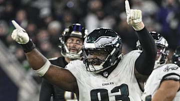 Dec 1, 2024; Baltimore, Maryland, USA;  Philadelphia Eagles defensive tackle Milton Williams (93) celebrates as Baltimore Ravens place kicker Justin Tucker (9) reacts to missing a second half field goal at M&T Bank Stadium. Mandatory Credit: Tommy Gilligan-Imagn Images