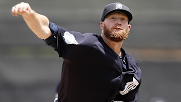 Former Detroit Tigers pitcher Chad Green pitches before the first inning of a spring training baseball game against the New York Yankees at Joker Marchant Stadium.