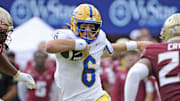 Oct 11, 2025; Tallahassee, Florida, USA; Pittsburgh Panthers quarterback Mason Heintschel (6) runs the ball in the first quarter against the Florida State Seminoles at Doak S. Campbell Stadium. Mandatory Credit: Melina Myers-Imagn Images