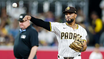Sep 23, 2025; San Diego, California, USA; San Diego Padres shortstop Xander Bogaerts (2) throws to first for an out during the fifth inning against the Milwaukee Brewers at Petco Park. Mandatory Credit: David Frerker-Imagn Images