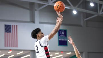 Kiyan Anthony of Long Island Lutheran takes a shot over Jeremiah Police of Westminster Academy in the City of Palms Classic on Tuesday, Dec. 19, 2023, at Suncoast Credit Union Arena in Fort Myers.