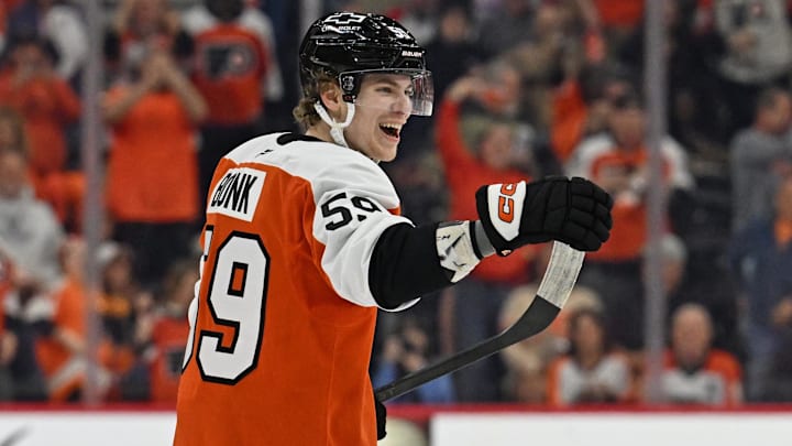 Apr 14, 2026; Philadelphia, Pennsylvania, USA; Philadelphia Flyers defenseman Oliver Bonk (59) celebrates his goal against the Montréal Canadiens during the first period at Xfinity Mobile Arena.