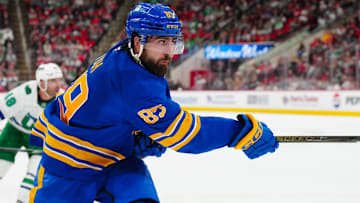 Feb 27, 2025; Raleigh, North Carolina, USA;  Buffalo Sabres right wing Alex Tuch (89) takes shot against the Carolina Hurricanes during the second period at Lenovo Center. Mandatory Credit: James Guillory-Imagn Images