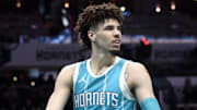 Mar 25, 2025; Charlotte, North Carolina, USA;  Charlotte Hornets guard LaMelo Ball (1) looks around after being called for a foul during the second half against the Orlando Magic at the Spectrum Center. Mandatory Credit: Sam Sharpe-Imagn Images