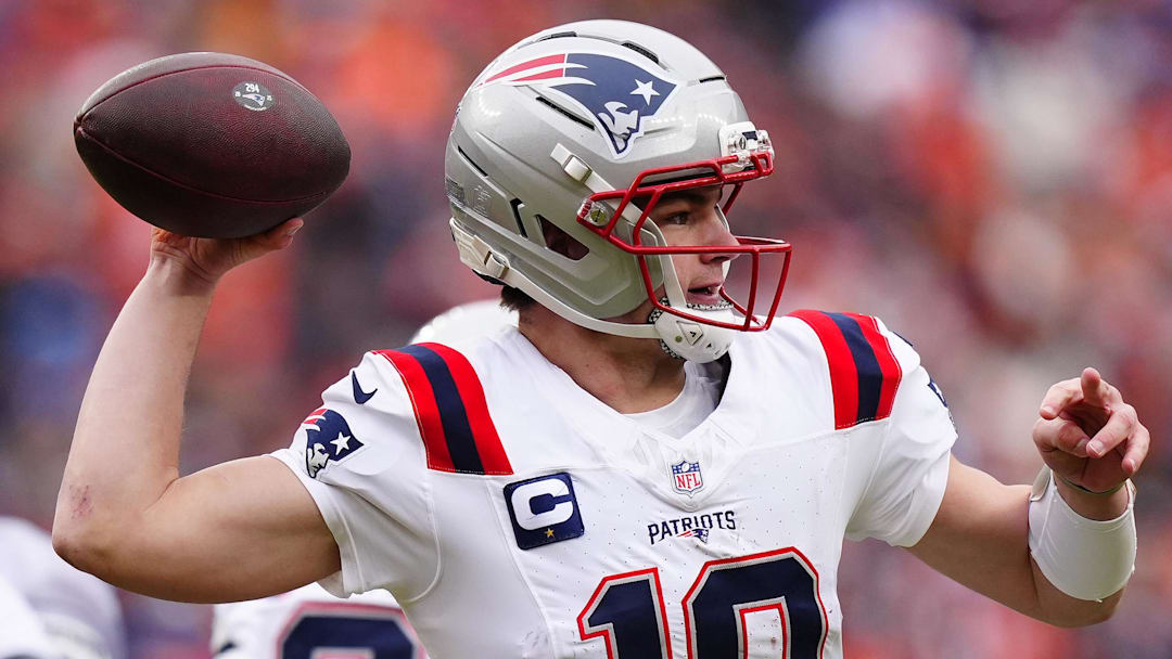 Jan 25, 2026; Denver, CO, USA; New England Patriots quarterback Drake Maye (10) drops back to pass against the Denver Broncos during the first half in the 2026 AFC Championship Game at Empower Field at Mile High. Mandatory Credit: Ron Chenoy-Imagn Images