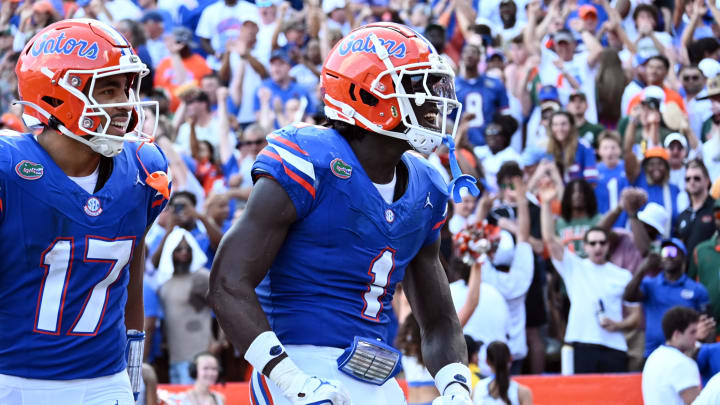 Florida Gators running back Montrell Johnson Jr. celebrates his touchdown against the Miami Hurricanes.